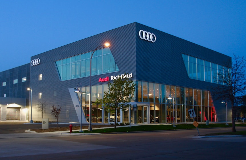Richfield Audi Dealership front corner wide, night